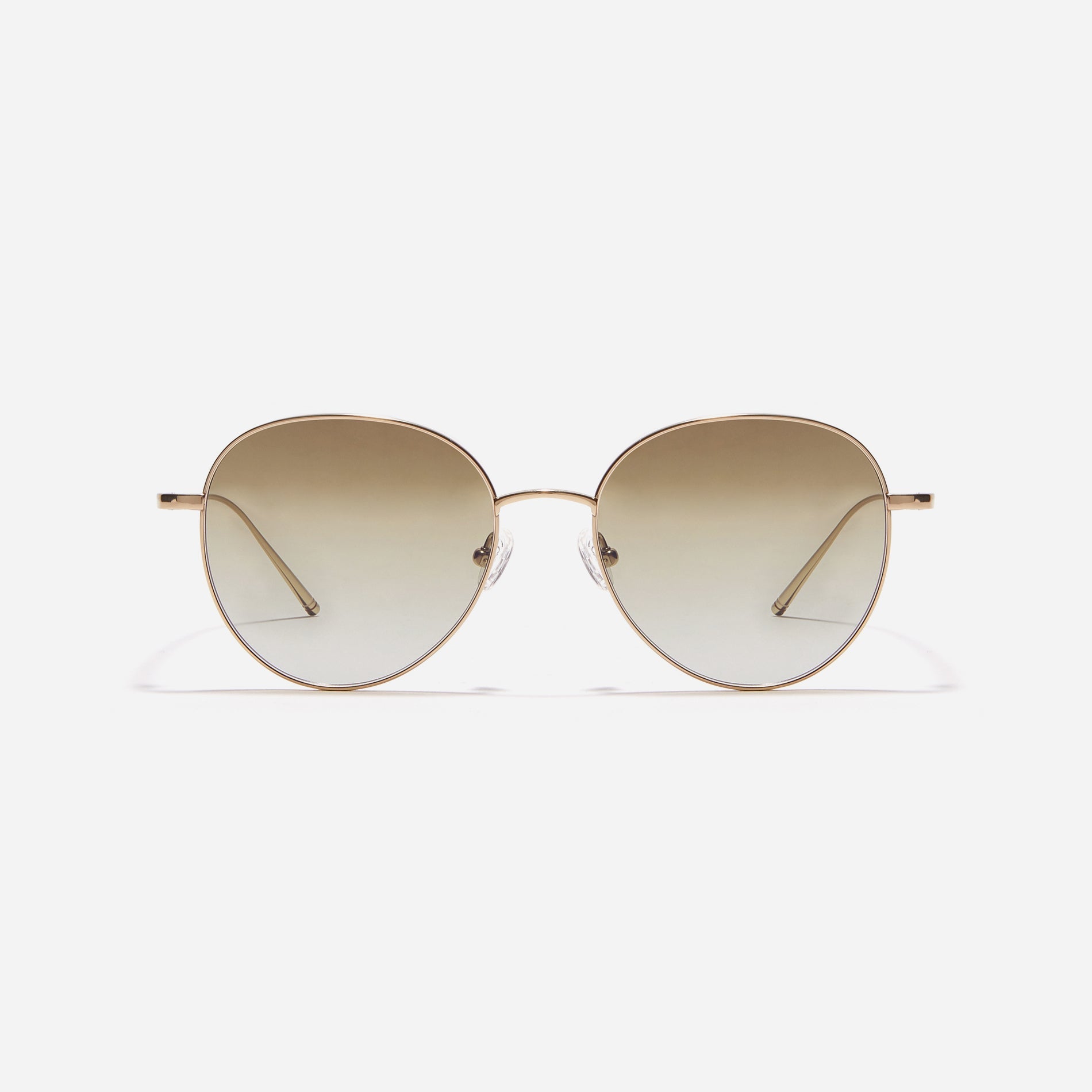 Round-shaped sunglasses crafted entirely from lightweight titanium. They feature semi-mirrored lenses that effectively reflect light, minimizing eye fatigue.