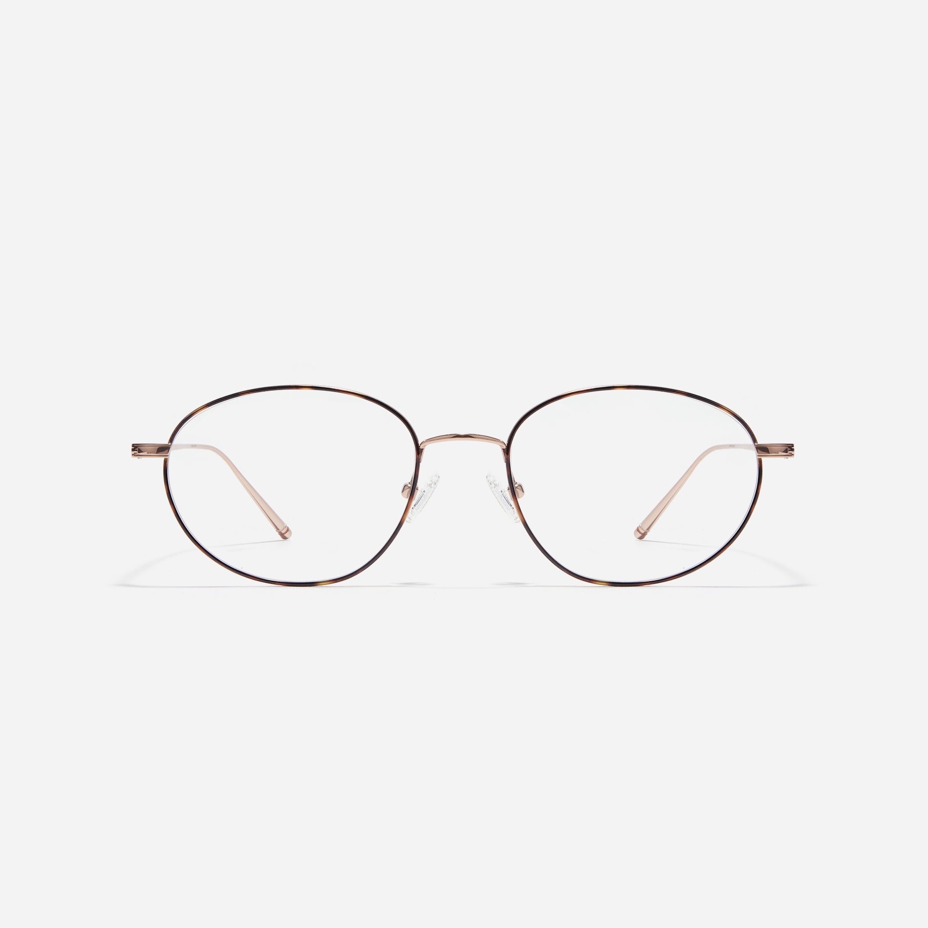 Stylish oval-shaped eyeglasses with slender rims. Crafted entirely from titanium, they guarantee a lighter and more comfortable fit. With a variety of colors available, Edell offers a fashionable style for both men and women.