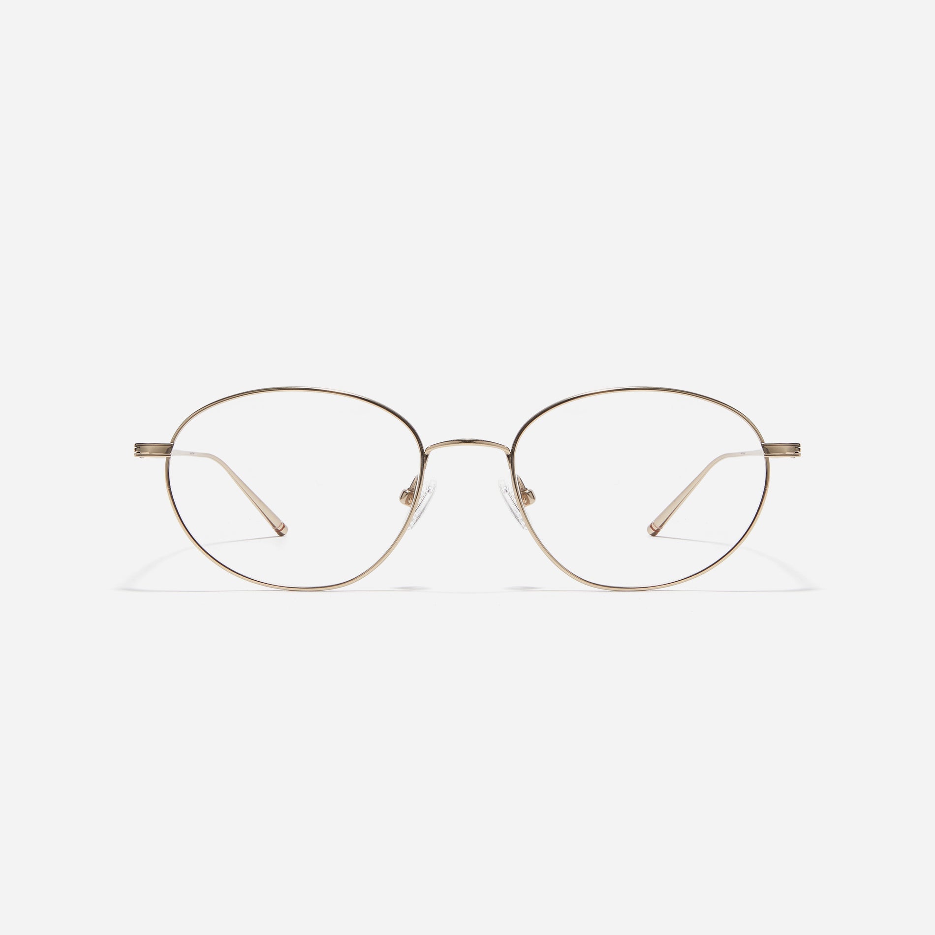Stylish oval-shaped eyeglasses with slender rims. Crafted entirely from titanium, they guarantee a lighter and more comfortable fit. With a variety of colors available, Edell offers a fashionable style for both men and women.