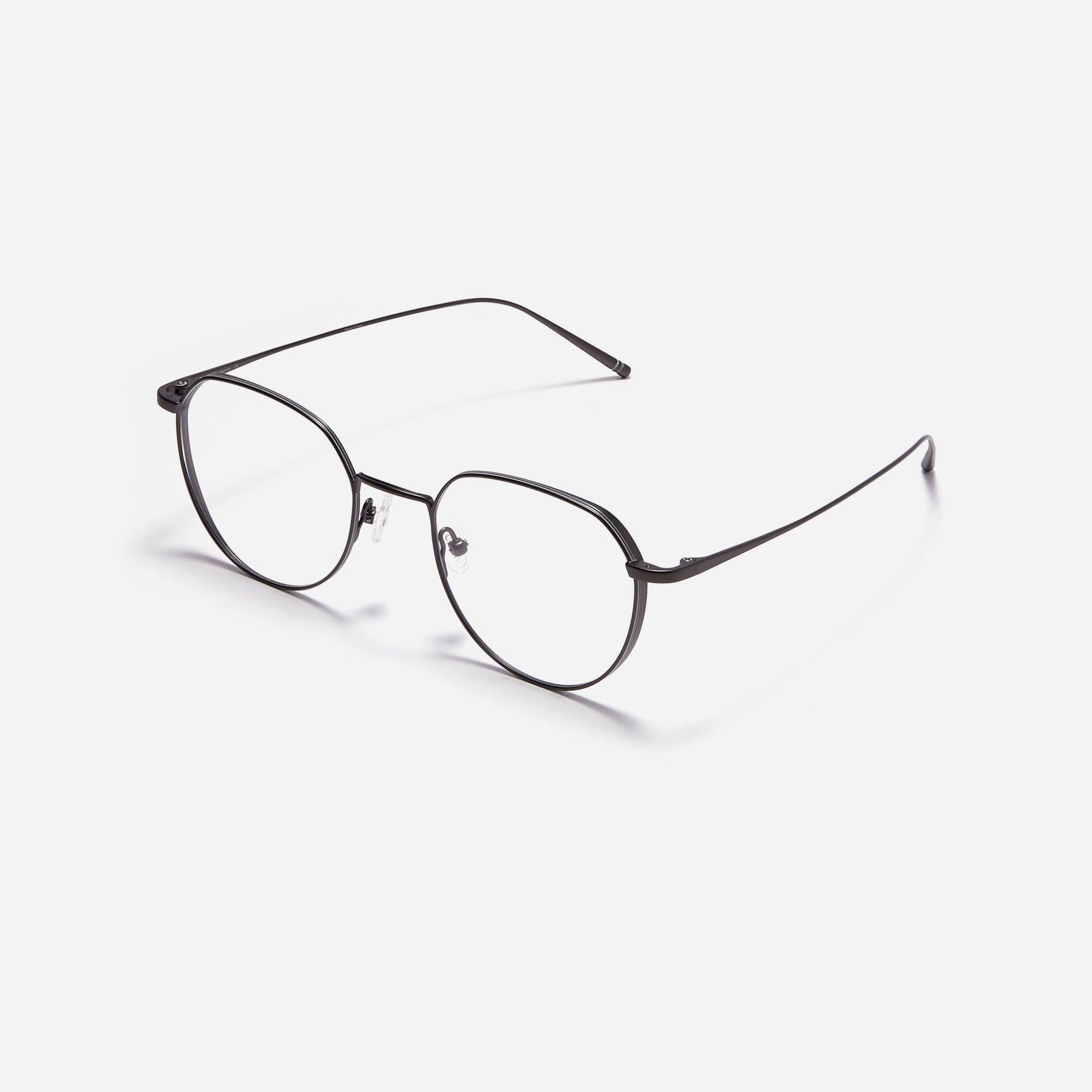 Polygonal-shaped, full-metal eyeglasses with a dual-rim structure designed to accommodate thicker, high-prescription lenses. Both the frame and temples are made of pure titanium, ensuring a lightweight and comfortable fit.