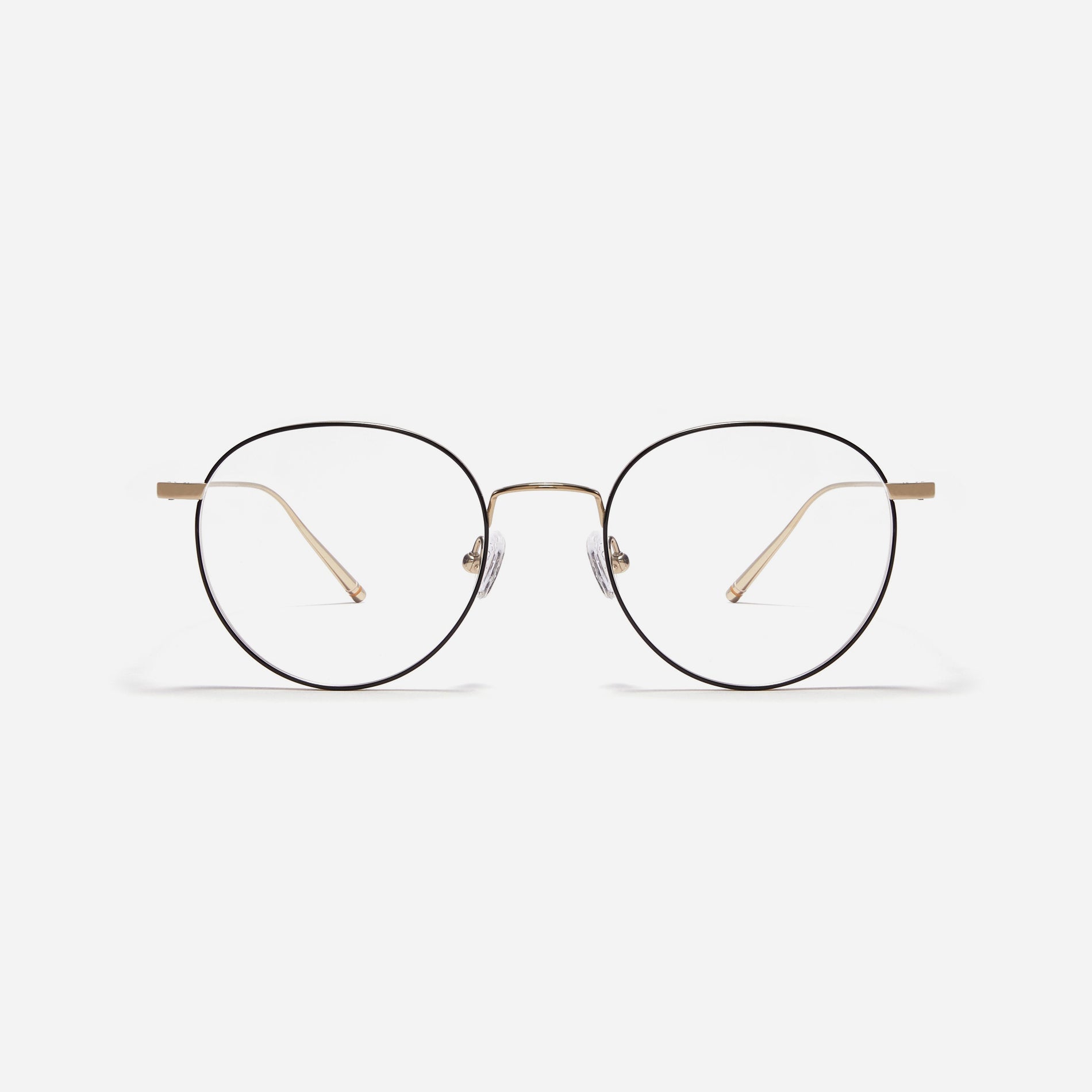 Round-shaped, full-metal eyeglasses with a dual-rim structure designed to accommodate thicker, high-prescription lenses. Both the frame and temples are made of pure titanium, ensuring a lightweight and comfortable fit.