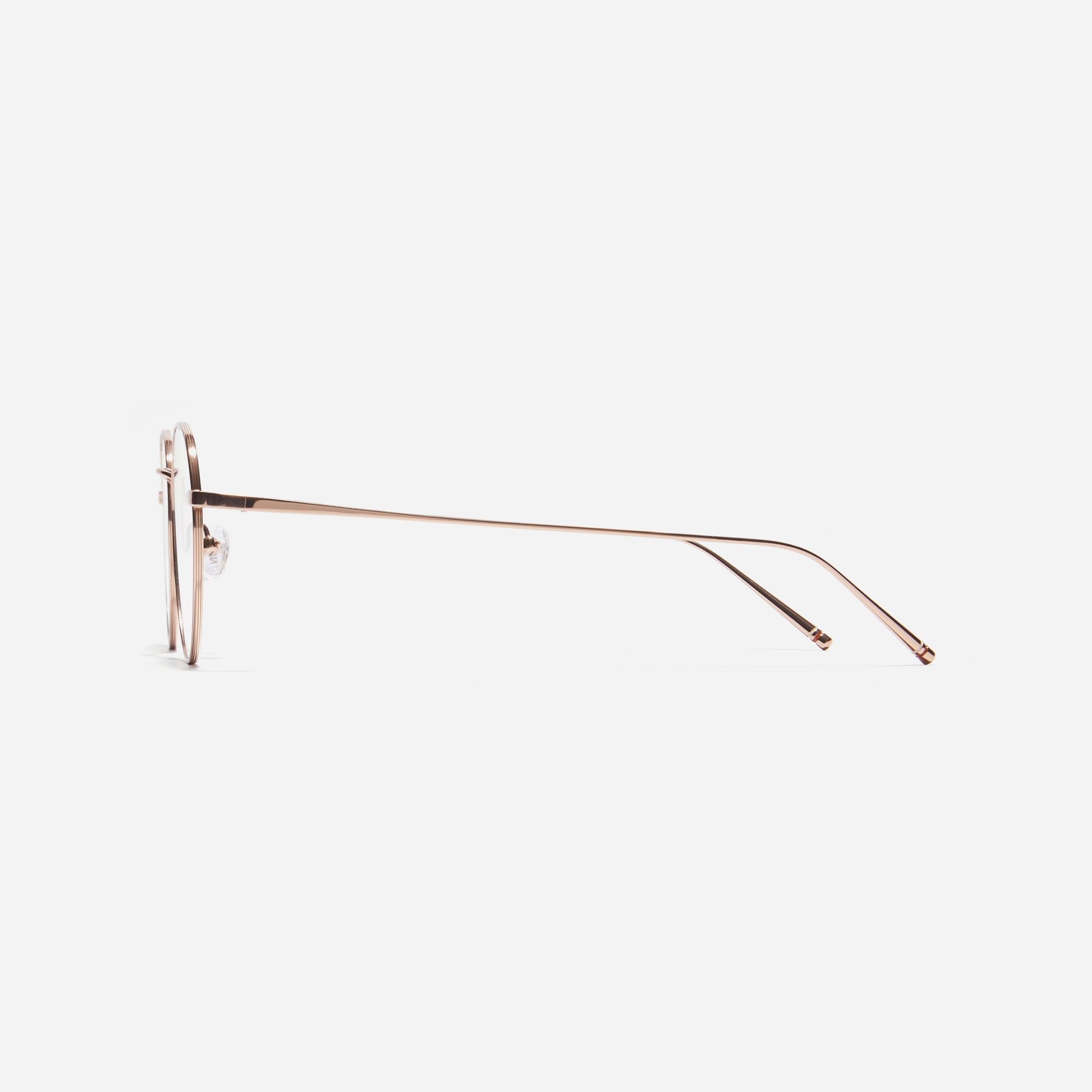Polygon-shaped eyeglasses designed to effortlessly complement all face shapes. Crafted entirely from titanium, they ensure a remarkably light and durable wearing experience. Lika's casual design adds a fashionable touch to your daily look.