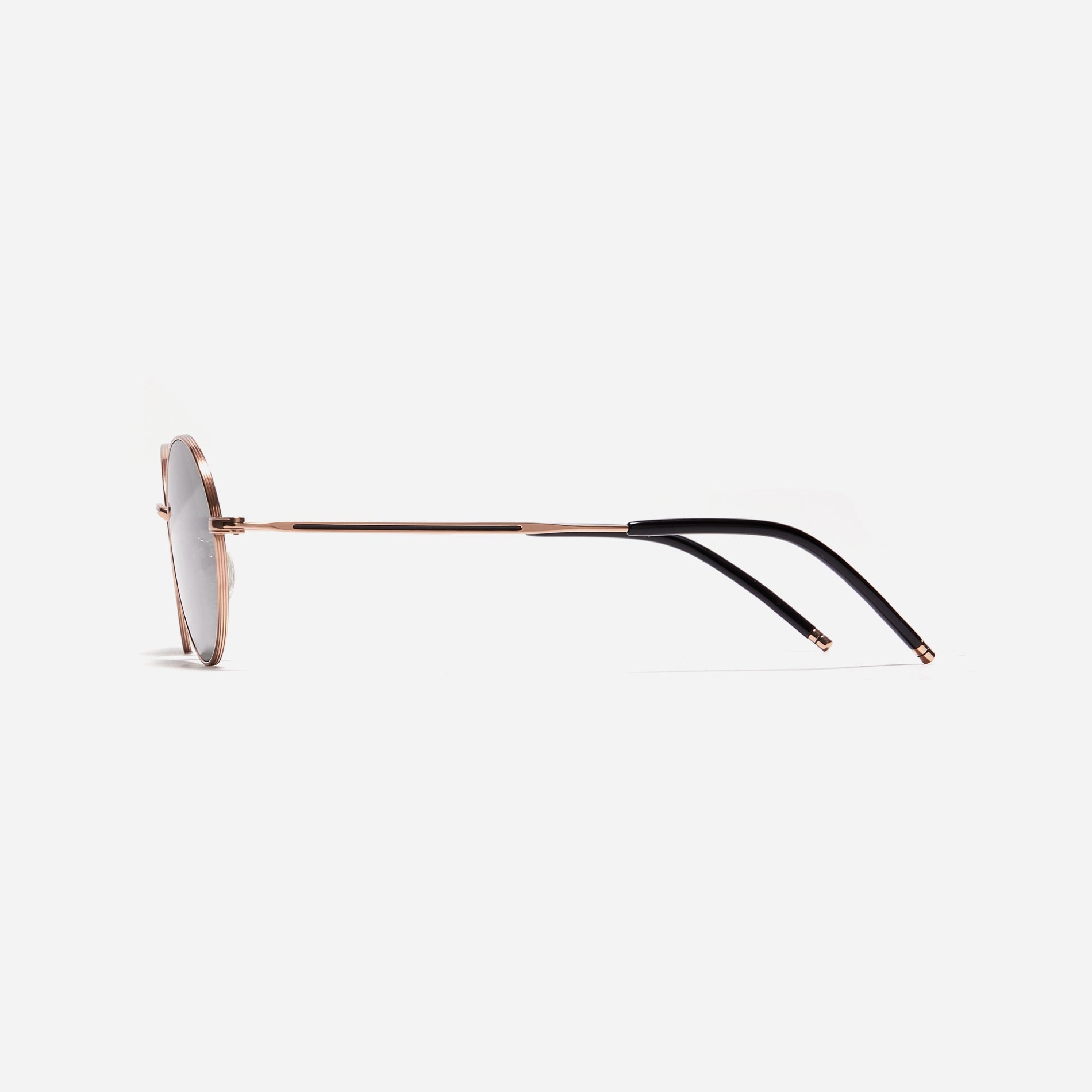 Tinted sunglasses with an oval frame crafted entirely from titanium.