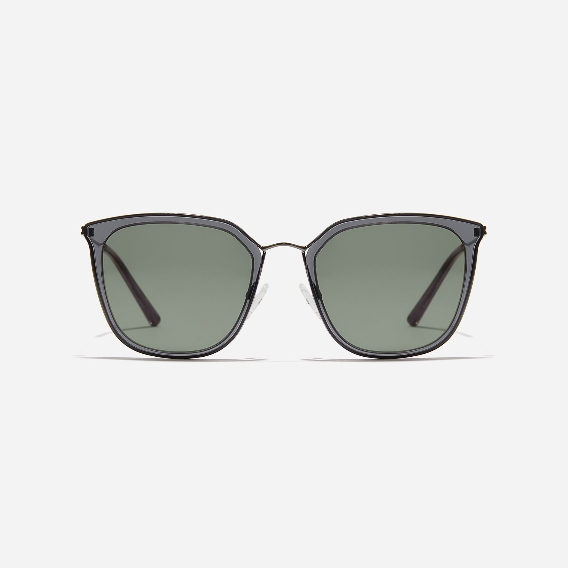 Round-shaped metal sunglasses that offer a soft and natural look with a peach-shaded titanium frame.