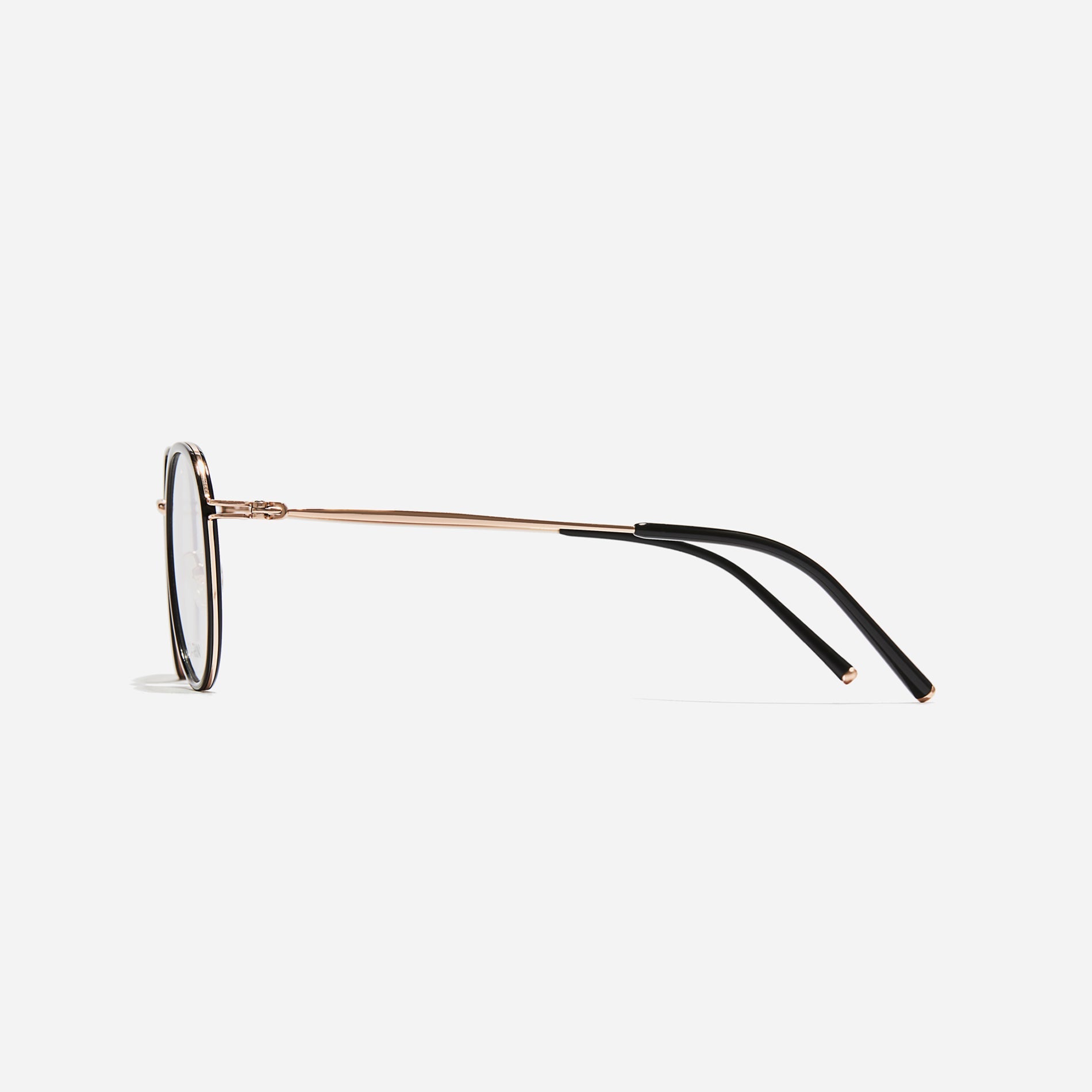 Polygonal-shaped eyeglasses that feature a contrasting round lens design, offering a smooth yet refined style. They provide a comfortable wearing experience with slim temples made from lightweight and elastic B-Titanium material.