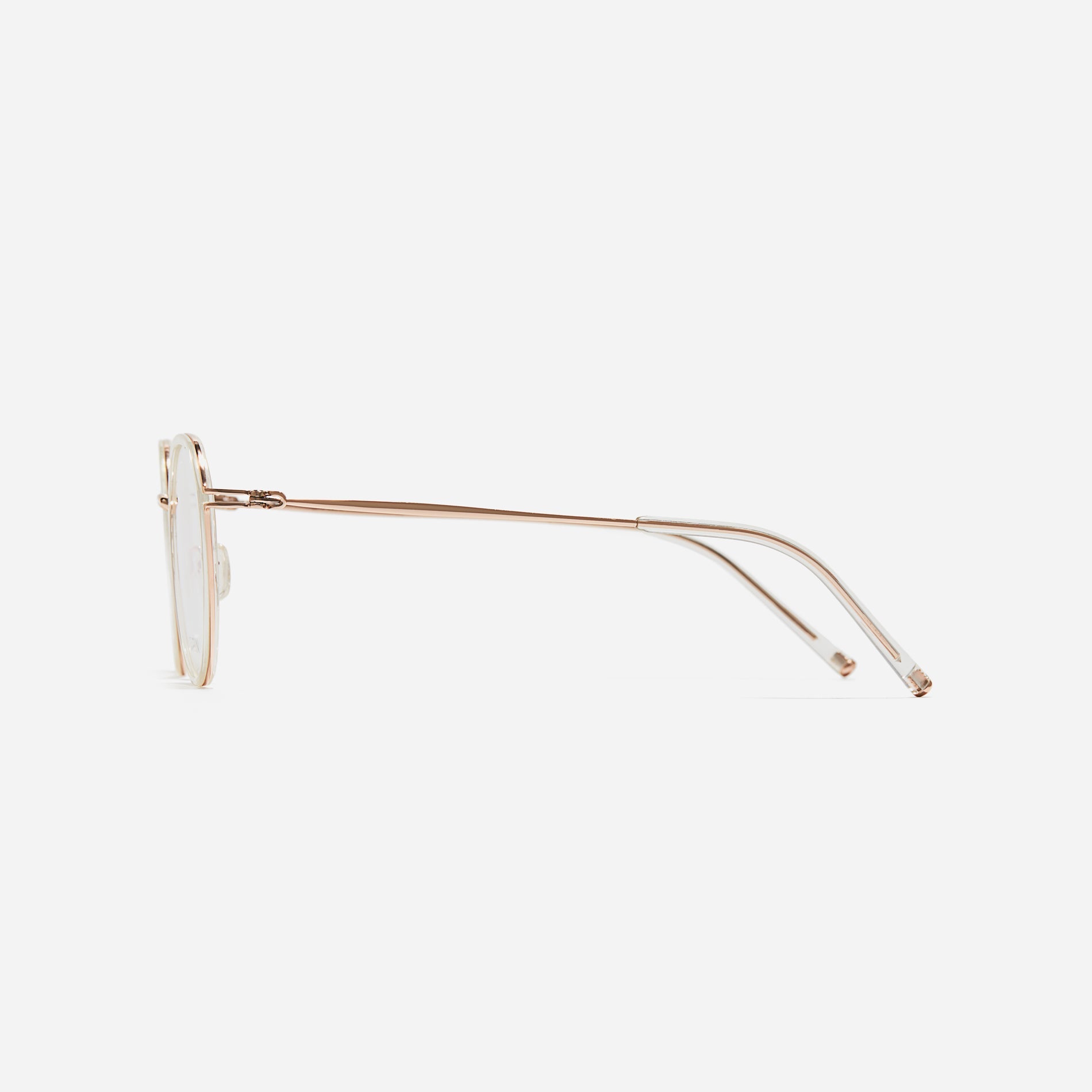 Polygonal-shaped eyeglasses that feature a contrasting round lens design, offering a smooth yet refined style. They provide a comfortable wearing experience with slim temples made from lightweight and elastic B-Titanium material.