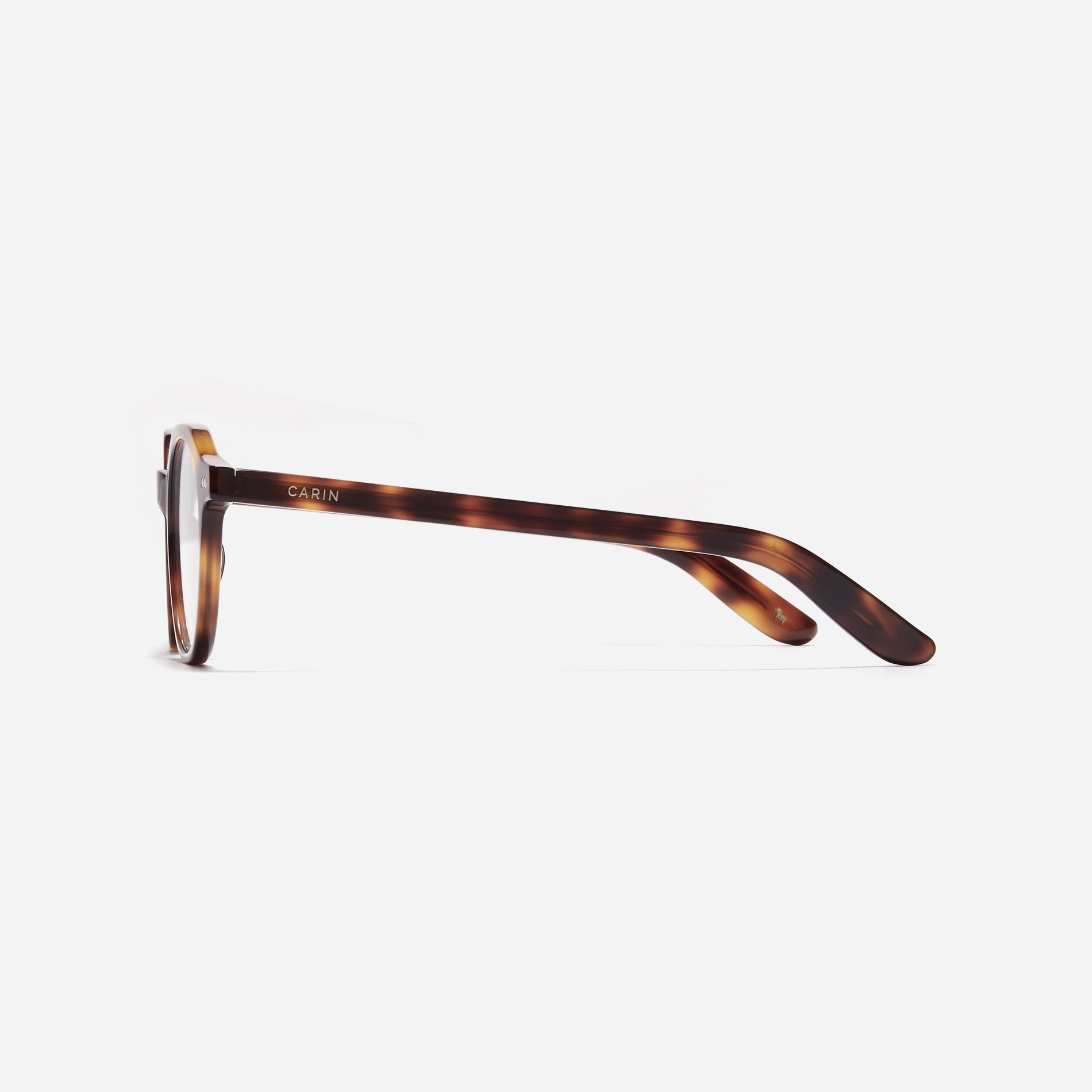 Polygon-shaped horn-rimmed eyeglasses. Embodying a modern reinterpretation of '90s retro vibes, their design is created for effortless styling. Featuring a distinctive bold frame and a stylish polygonal shape, these eyeglasses are available in a variety of colors.