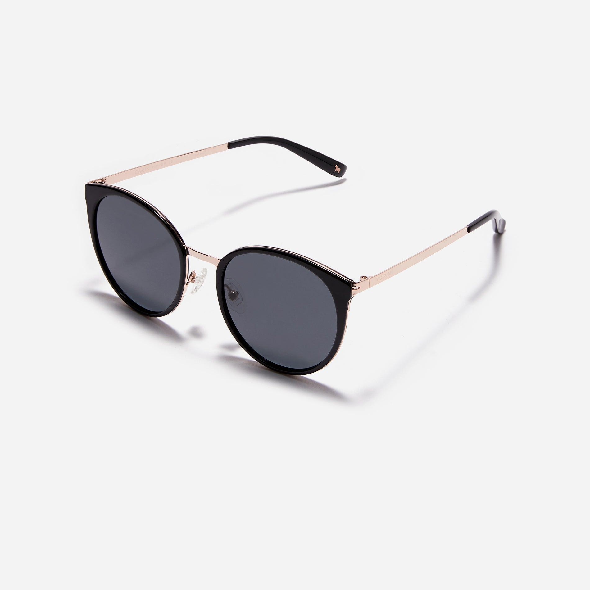Round-shaped combination polarized sunglasses that feature delicate acetate rims and metal structural details.
