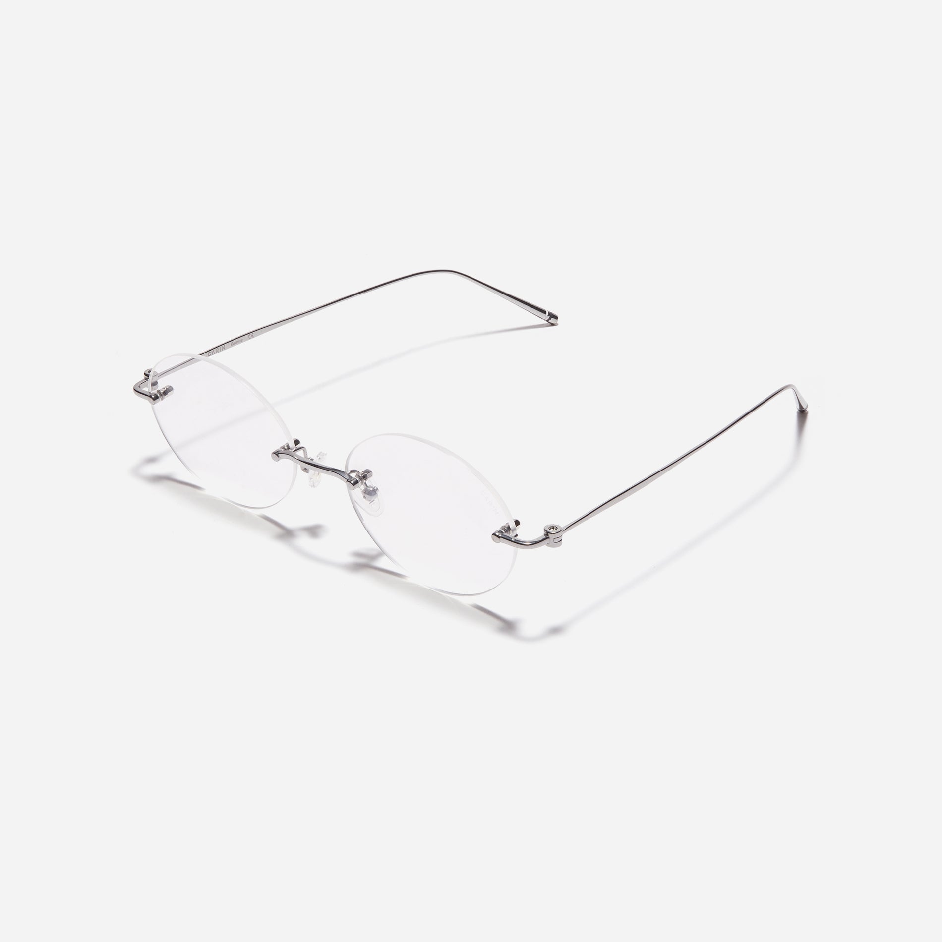 Rimless round-shaped retro eyeglasses. Featuring narrow rims and dual lining on the tips, these eyeglasses ensure a consistently comfortable fit and prevent slipping.