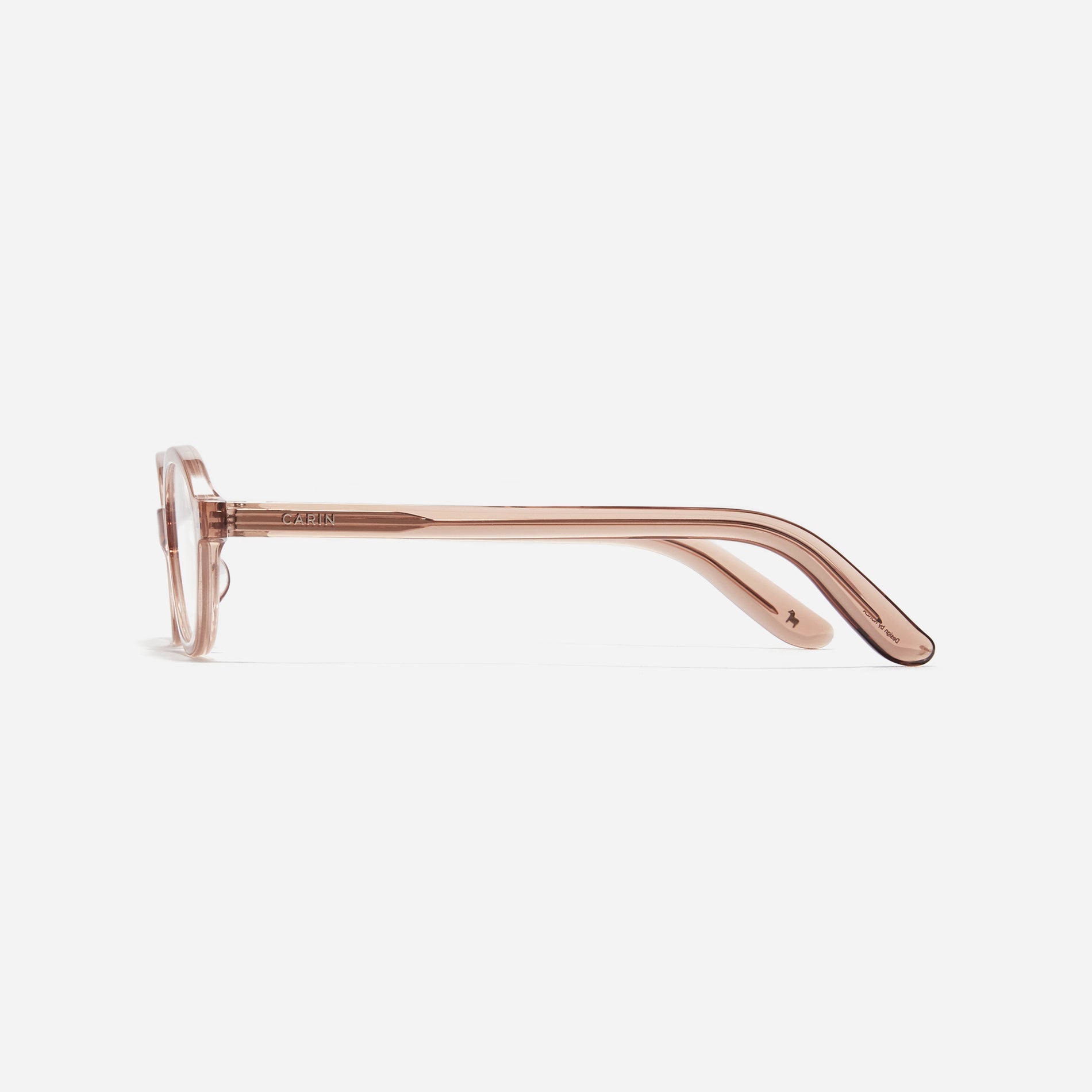 Compact, oval-shaped horn-rimmed eyeglasses featuring a narrow rim and bold frame. Their design captures a modern reinterpretation of 90s retro vibes, providing a trendy and stylish look.