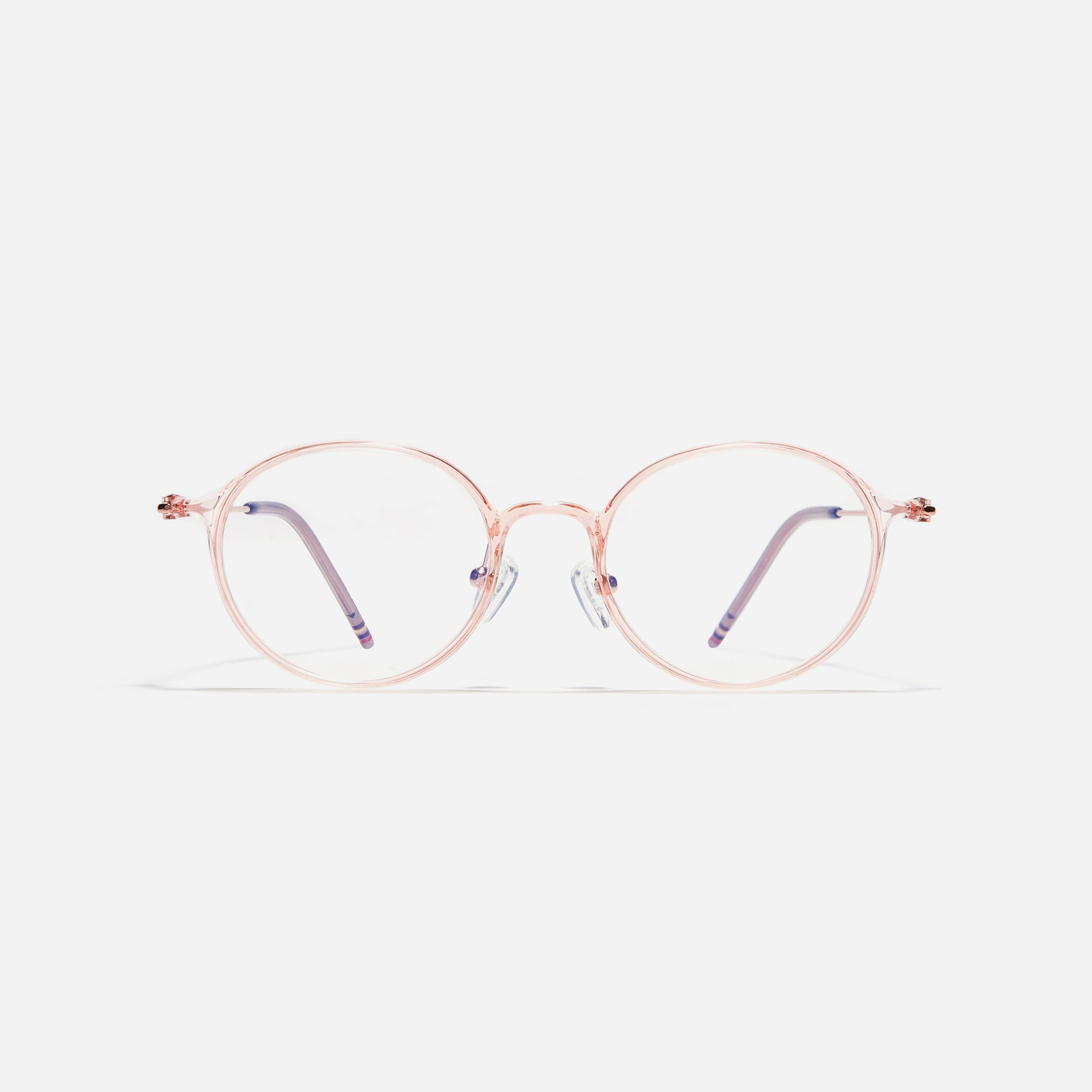 Junior Air R are newly introduced, ultra-lightweight, round junior eyeglasses by CARIN. Crafted from eco-friendly hypoallergenic materials sourced from the French company ARKEMA, these glasses offer robust durability that resists breakage. Incorporated with CARIN's patented anti-loosening hinge technology, these eyeglasses ensure a consistently comfortable fit.