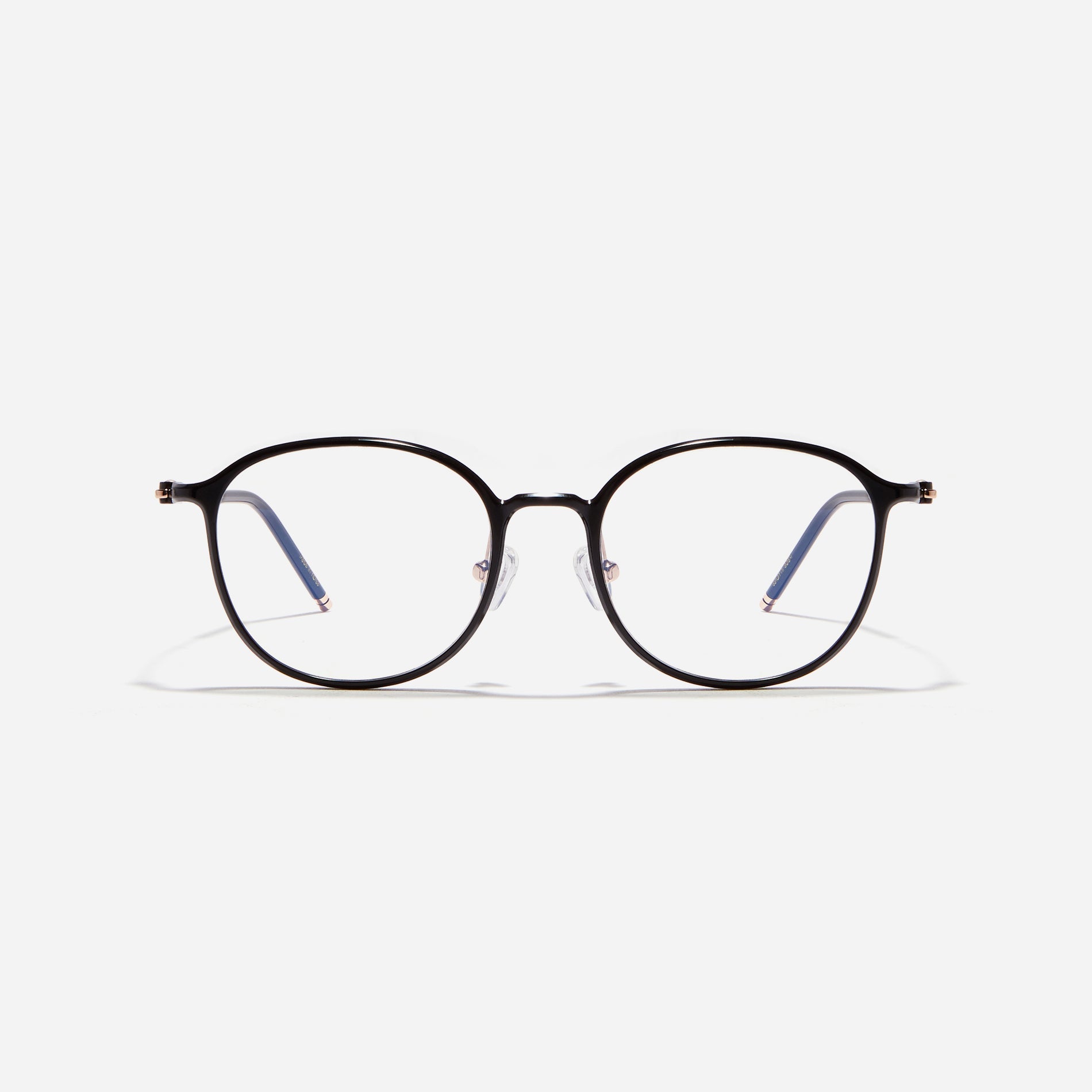 Ultra-lightweight round square-shaped eyeglasses crafted using cutting-edge materials sourced from the French company ARKEMA. These glasses offer robust durability and consistently comfortable fit.