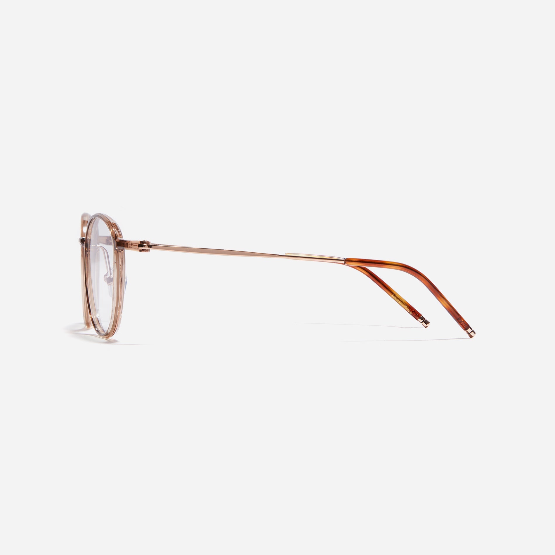 Ultra-lightweight round square-shaped eyeglasses crafted using cutting-edge materials sourced from the French company ARKEMA. These glasses offer robust durability and consistently comfortable fit.