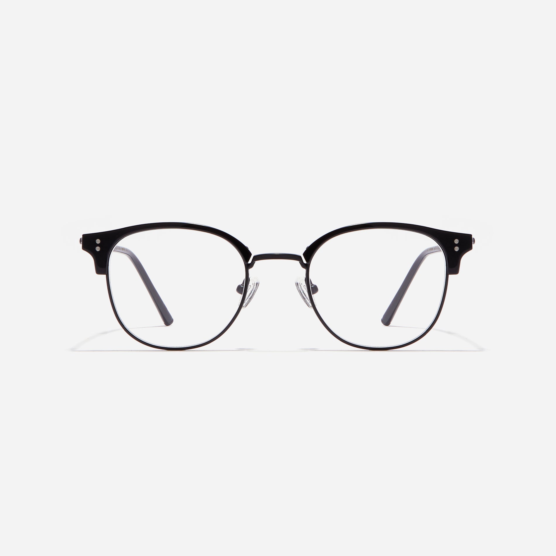 Square-shaped gold-rimmed eyeglasses. The frame, constructed from bioplastic and titanium, seamlessly merges exceptional durability with an ultra-lightweight build, while stylish nose bridge lining details enhance the overall design. The B-titanium temples deliver a lightweight and comfortable fit, guaranteeing prolonged wear without any discomfort.