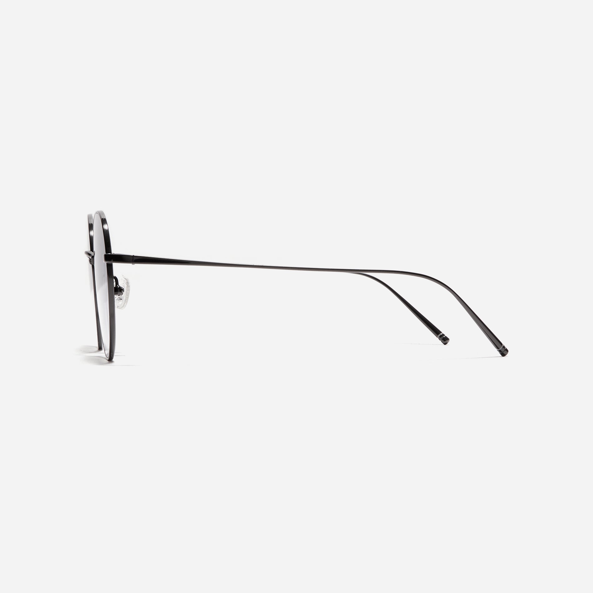 Round-shaped sunglasses crafted entirely from lightweight titanium. They feature semi-mirrored lenses that effectively reflect light, minimizing eye fatigue.