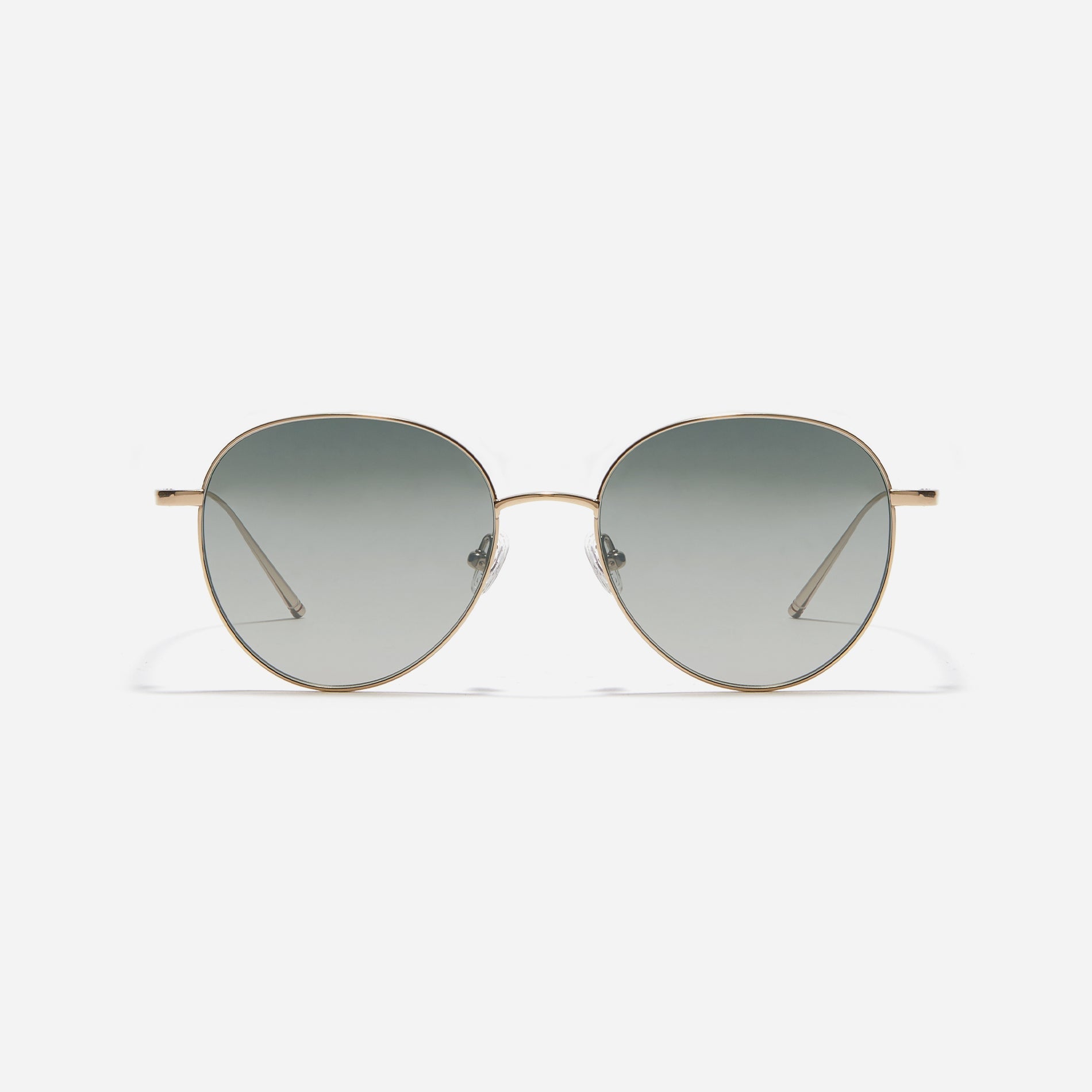 Round-shaped sunglasses crafted entirely from lightweight titanium. They feature semi-mirrored lenses that effectively reflect light, minimizing eye fatigue.