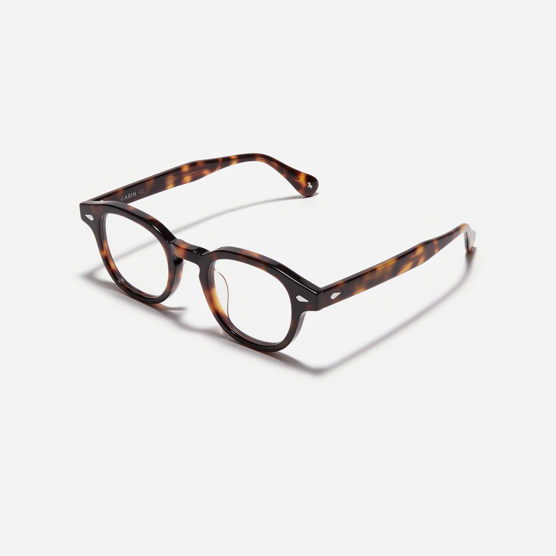 Round-shaped horn-rimmed eyeglasses featuring a sturdy and lightweight frame. Rena design incorporates dual lining on the tips to prevent slipping and ensure a consistently comfortable wearing experience.