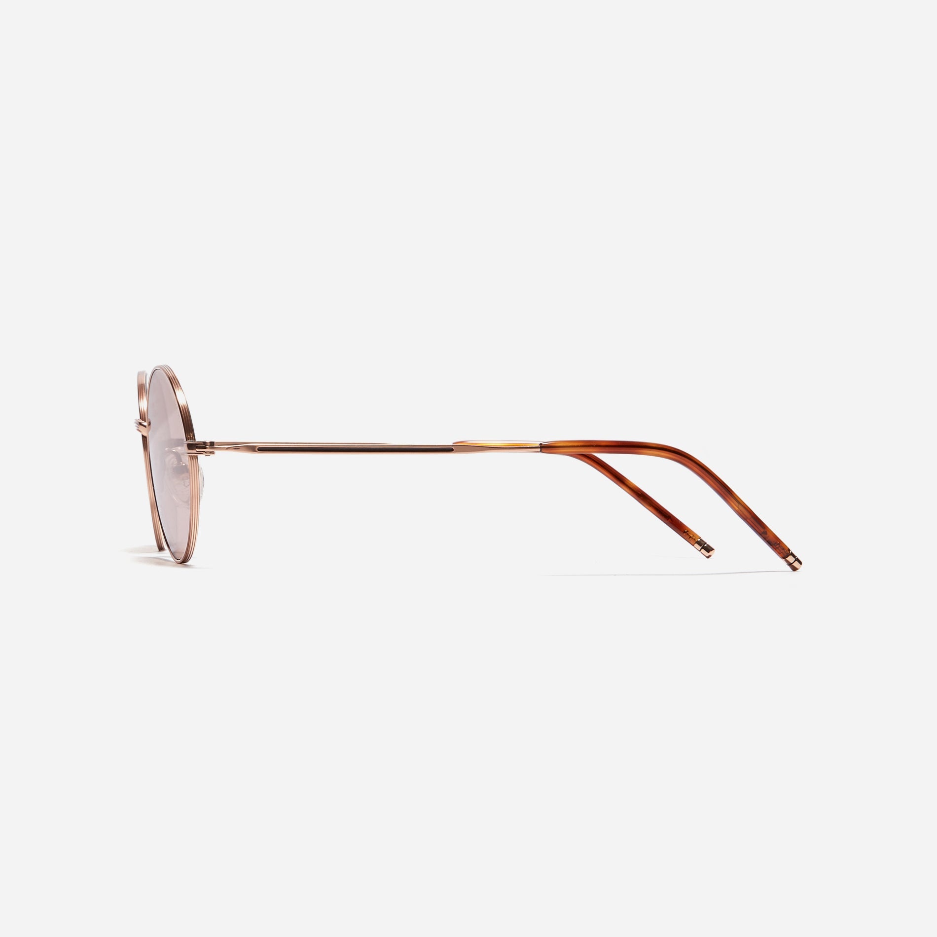 Tinted sunglasses with an oval frame crafted entirely from titanium.