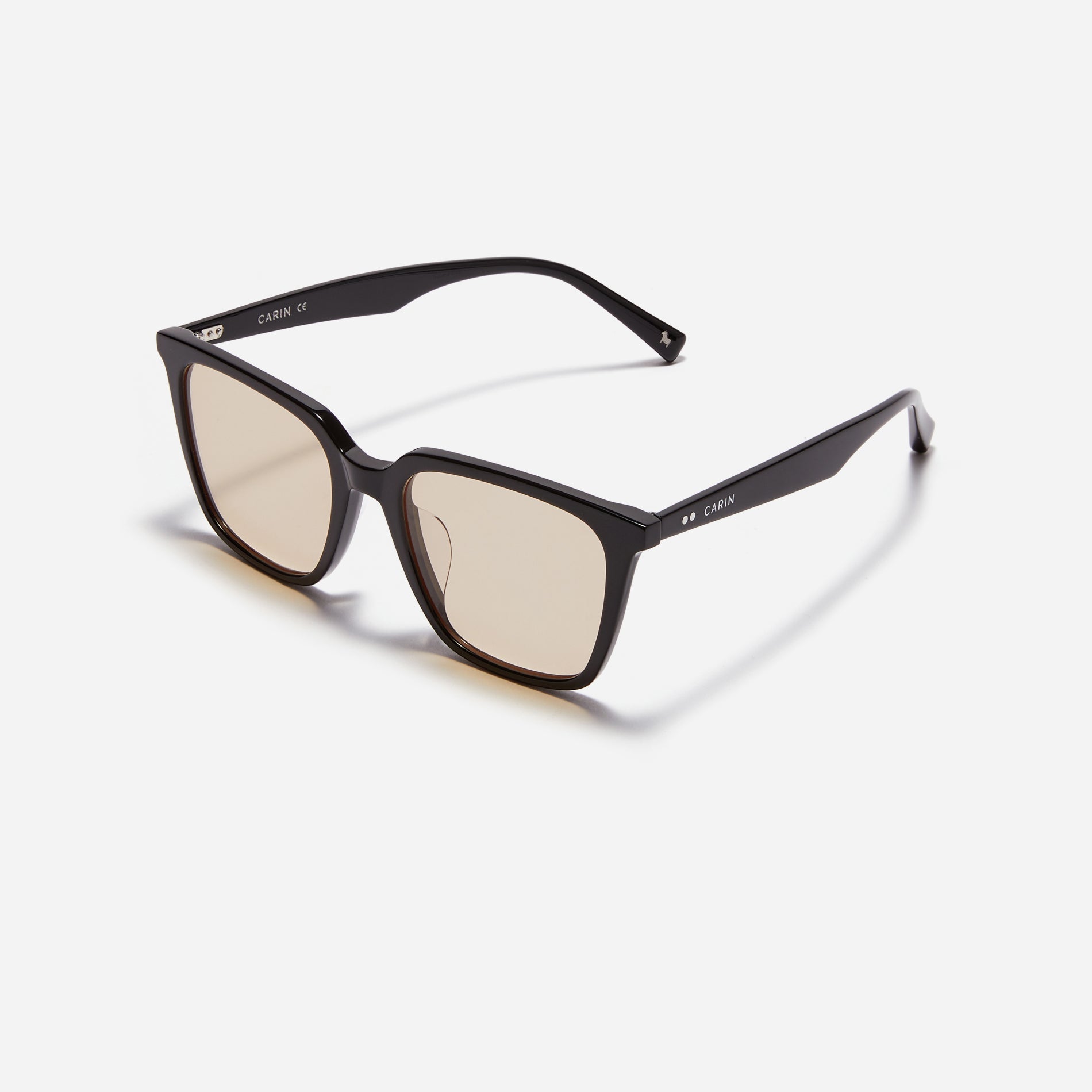 Square-shaped sunglasses with a sleek, straight-edged top front, providing a versatile and neutral style.