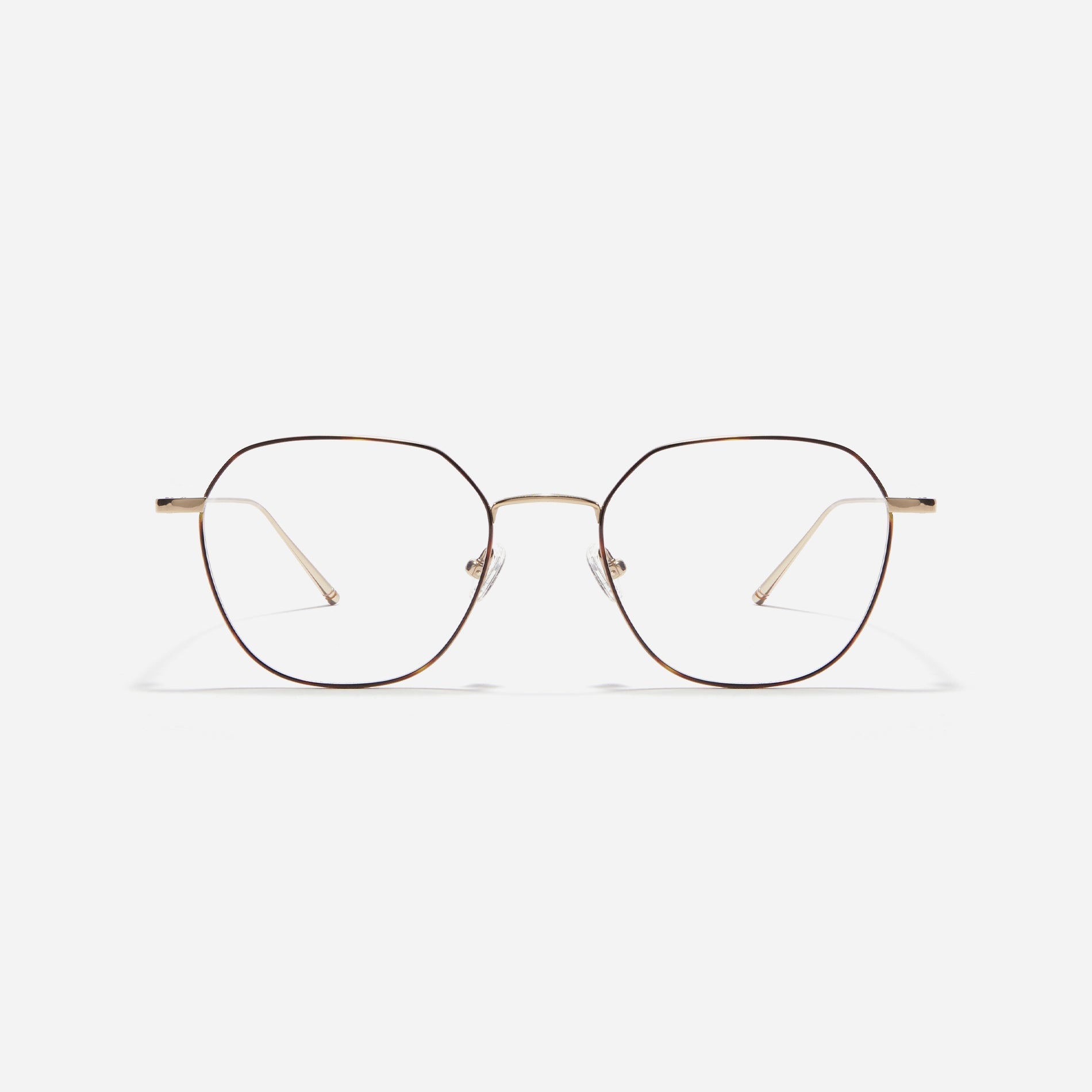 Norman glasses feature a polygonal shape with oversized rims. Crafted entirely from titanium, they are lightweight and comfortable to wear. Available in four different colors, these glasses offer fashionable styles suitable for both men and women.