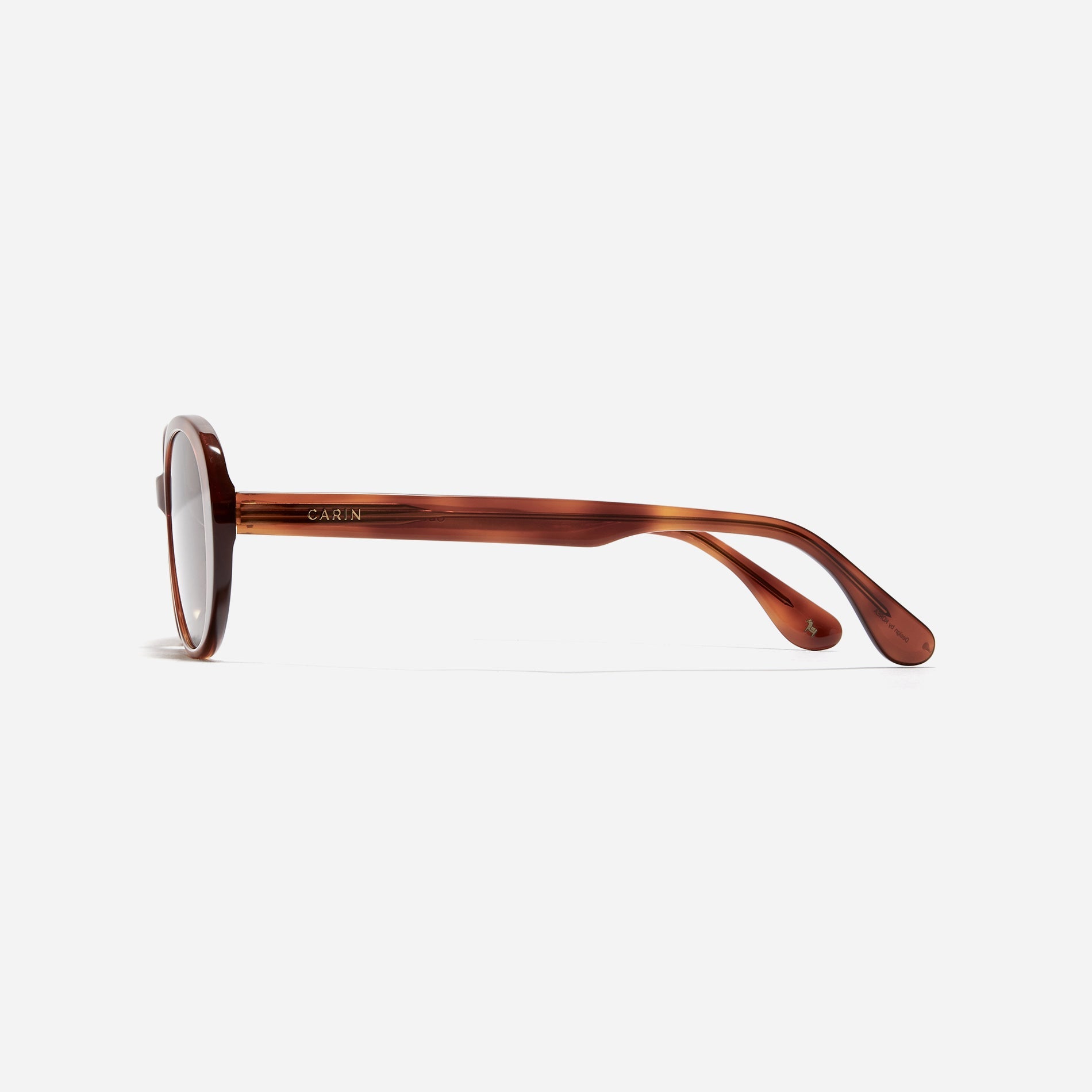 Oval-shaped petite frame sunglasses that feature a modern, unisex, and casual design that reinterprets retro sensibilities with a modern touch.