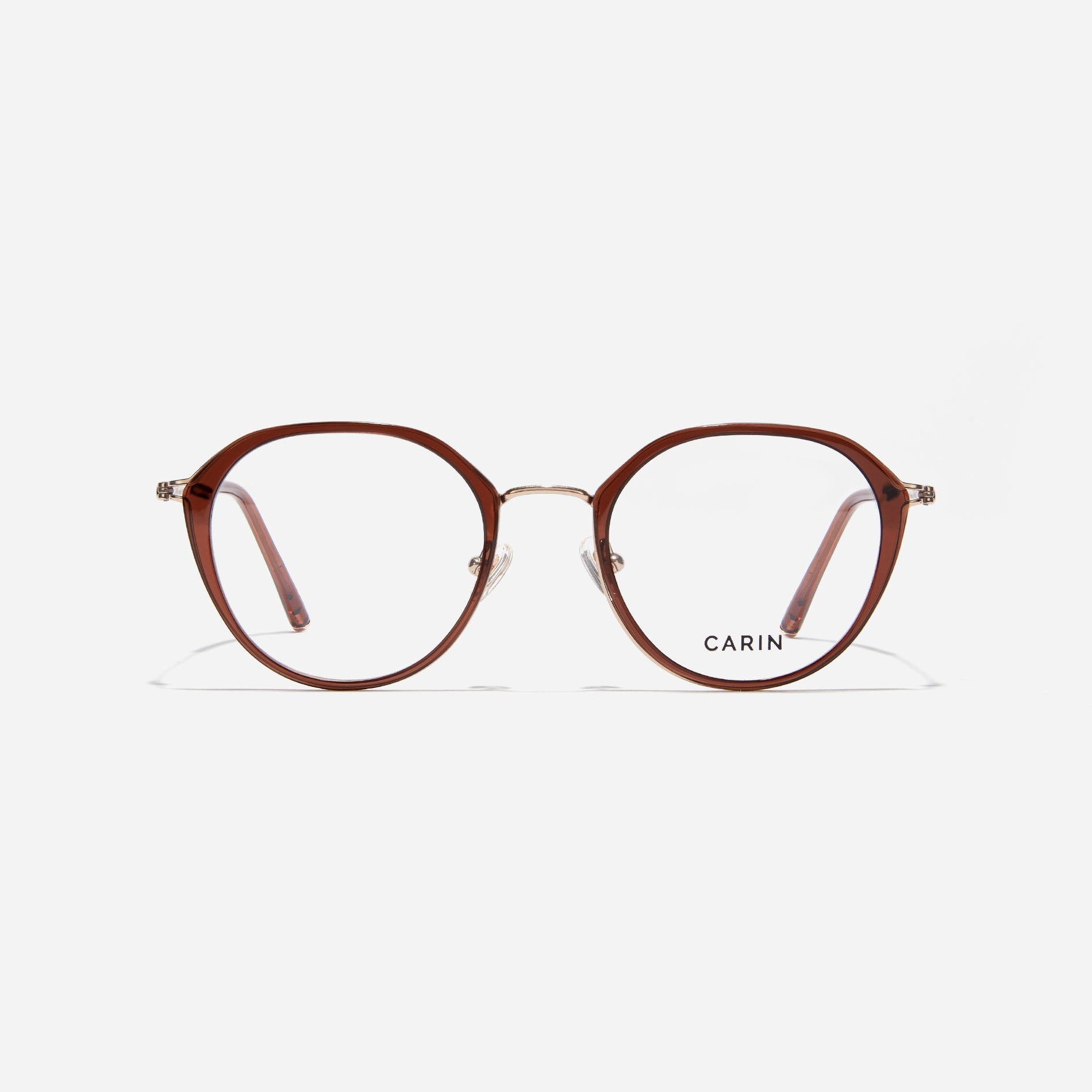 Polygonal-shaped eyeglasses that feature a contrasting round lens design, offering a smooth yet refined style.  They provide a comfortable wearing experience with slim temples made from lightweight and elastic B-Titanium material.