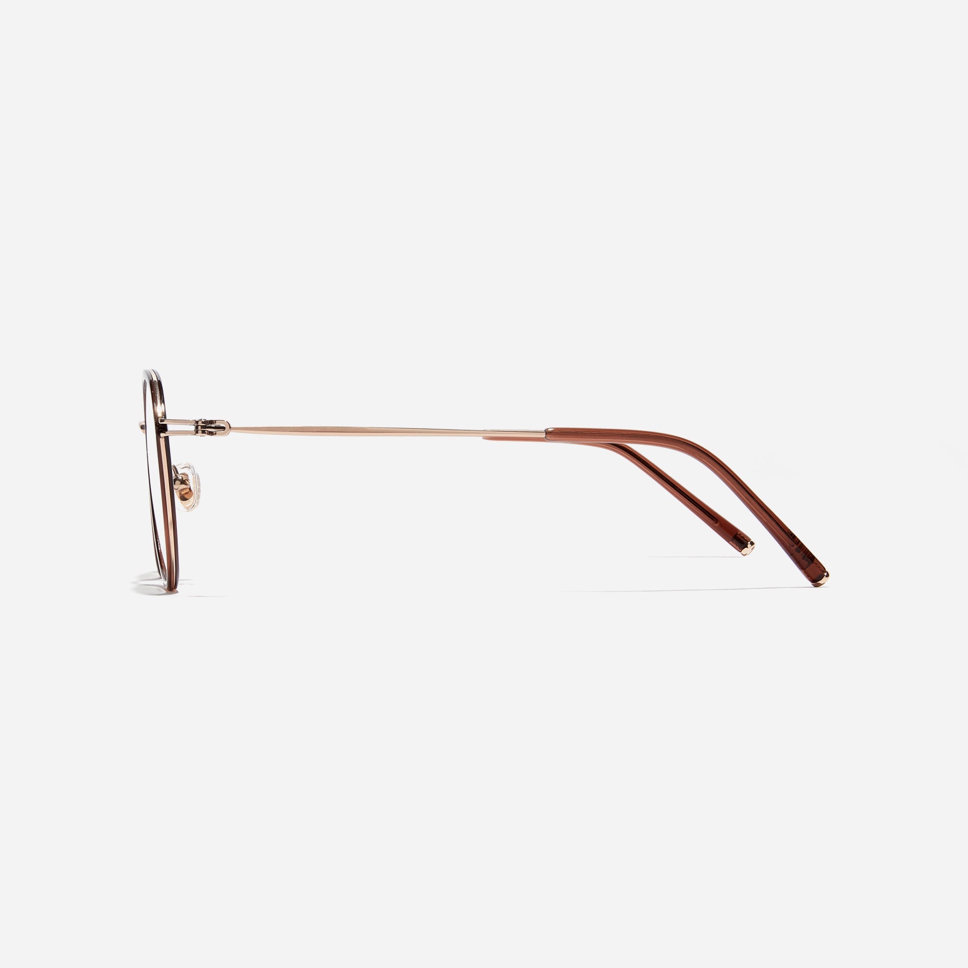 Polygonal-shaped eyeglasses that feature a contrasting round lens design, offering a smooth yet refined style.  They provide a comfortable wearing experience with slim temples made from lightweight and elastic B-Titanium material.