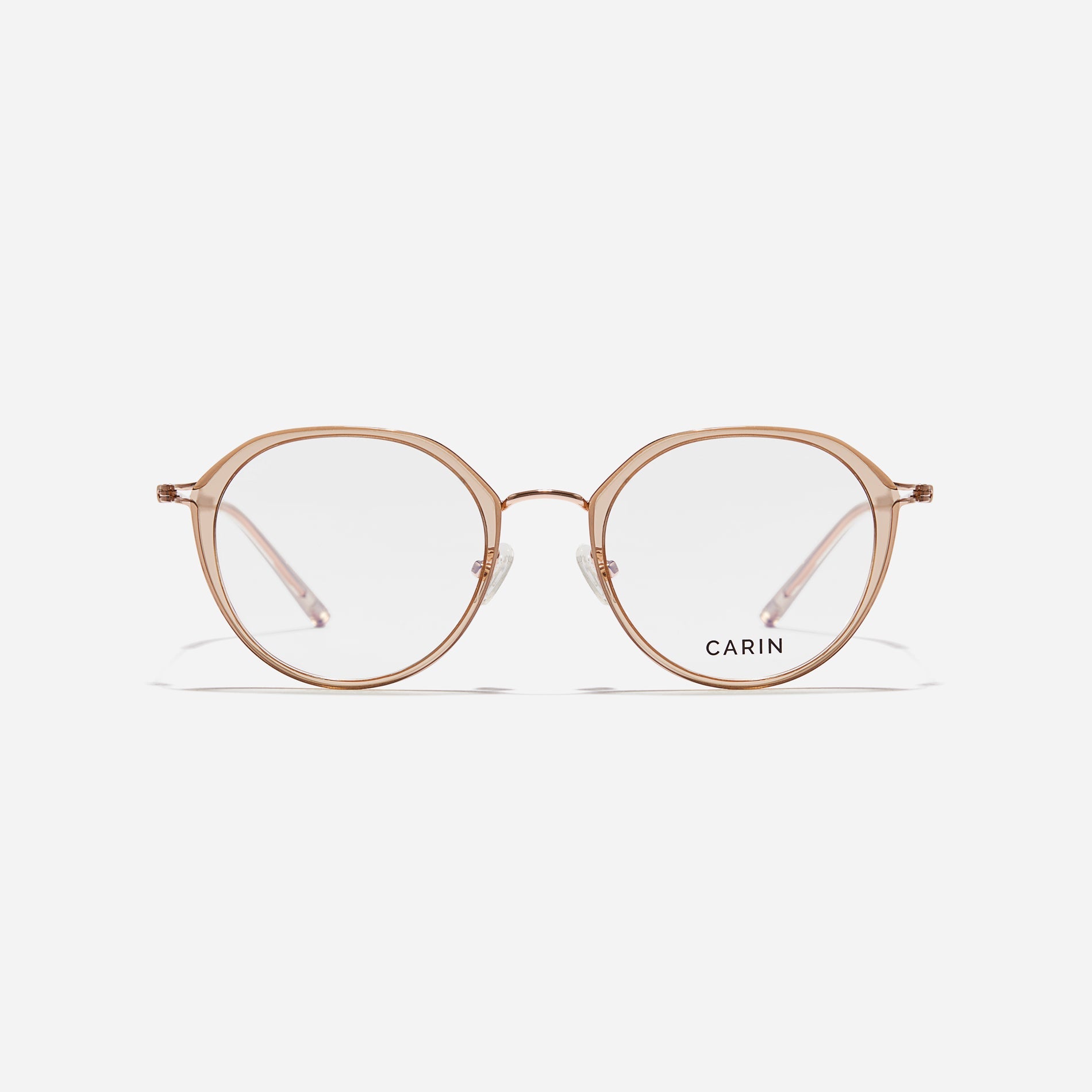 Polygonal-shaped eyeglasses that feature a contrasting round lens design, offering a smooth yet refined style.  They provide a comfortable wearing experience with slim temples made from lightweight and elastic B-Titanium material.