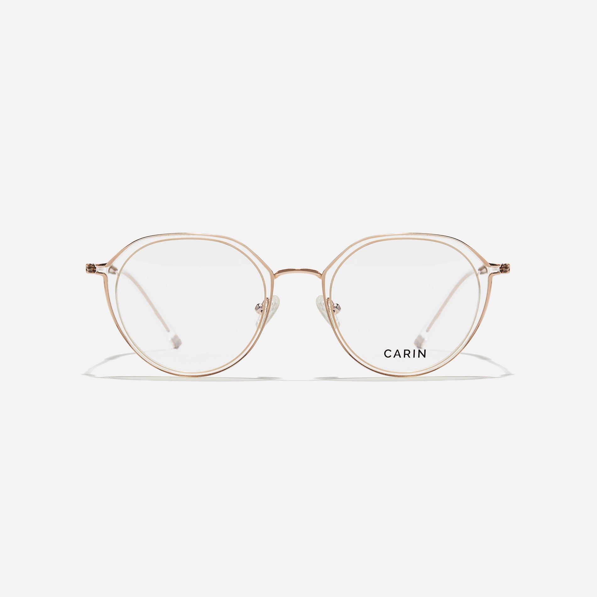 Polygonal-shaped eyeglasses that feature a contrasting round lens design, offering a smooth yet refined style.  They provide a comfortable wearing experience with slim temples made from lightweight and elastic B-Titanium material.