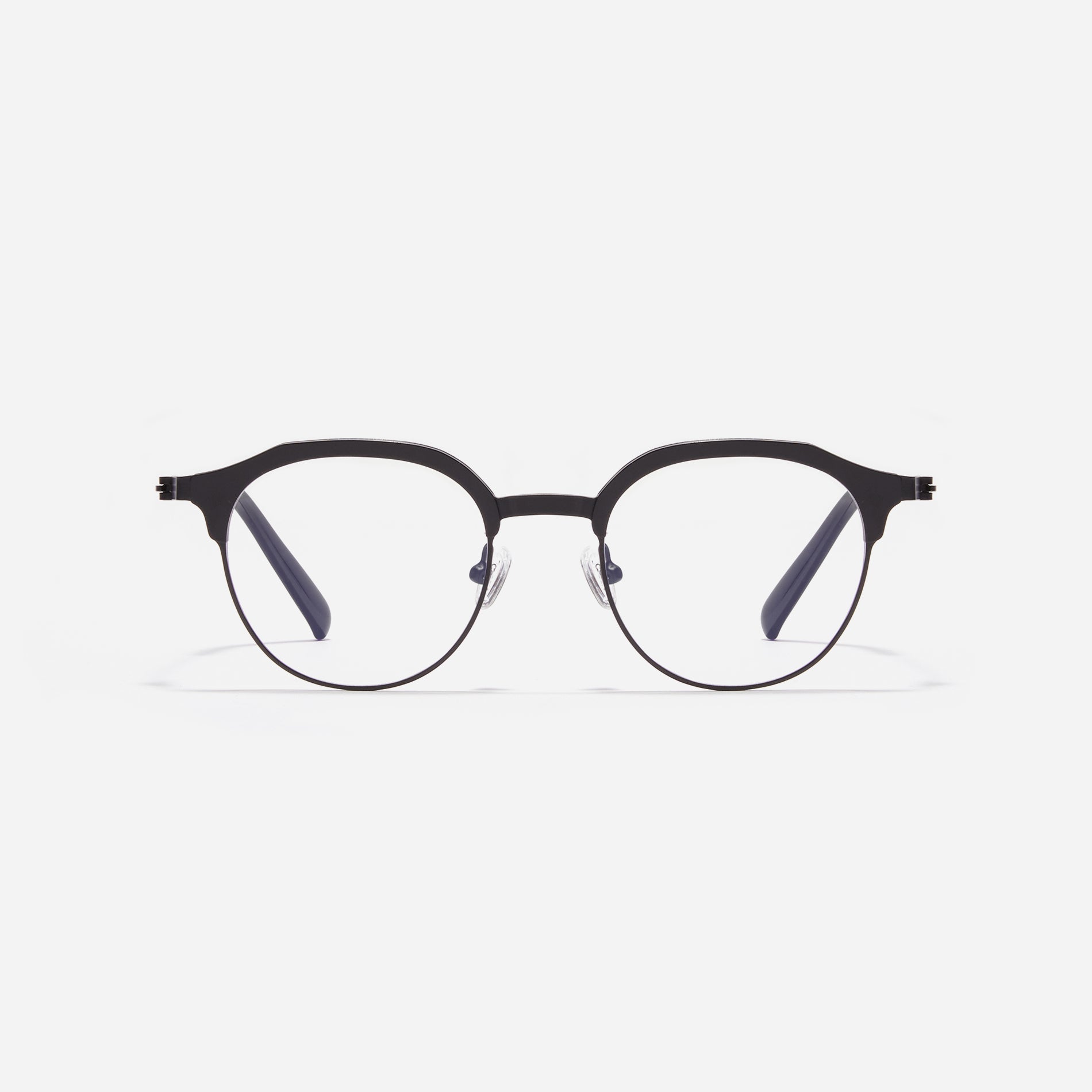 Lightweight polygon-shaped eyeglasses from CARIN's 'Feather Fit' line, offering a contemporary twist on the classic browline design. 