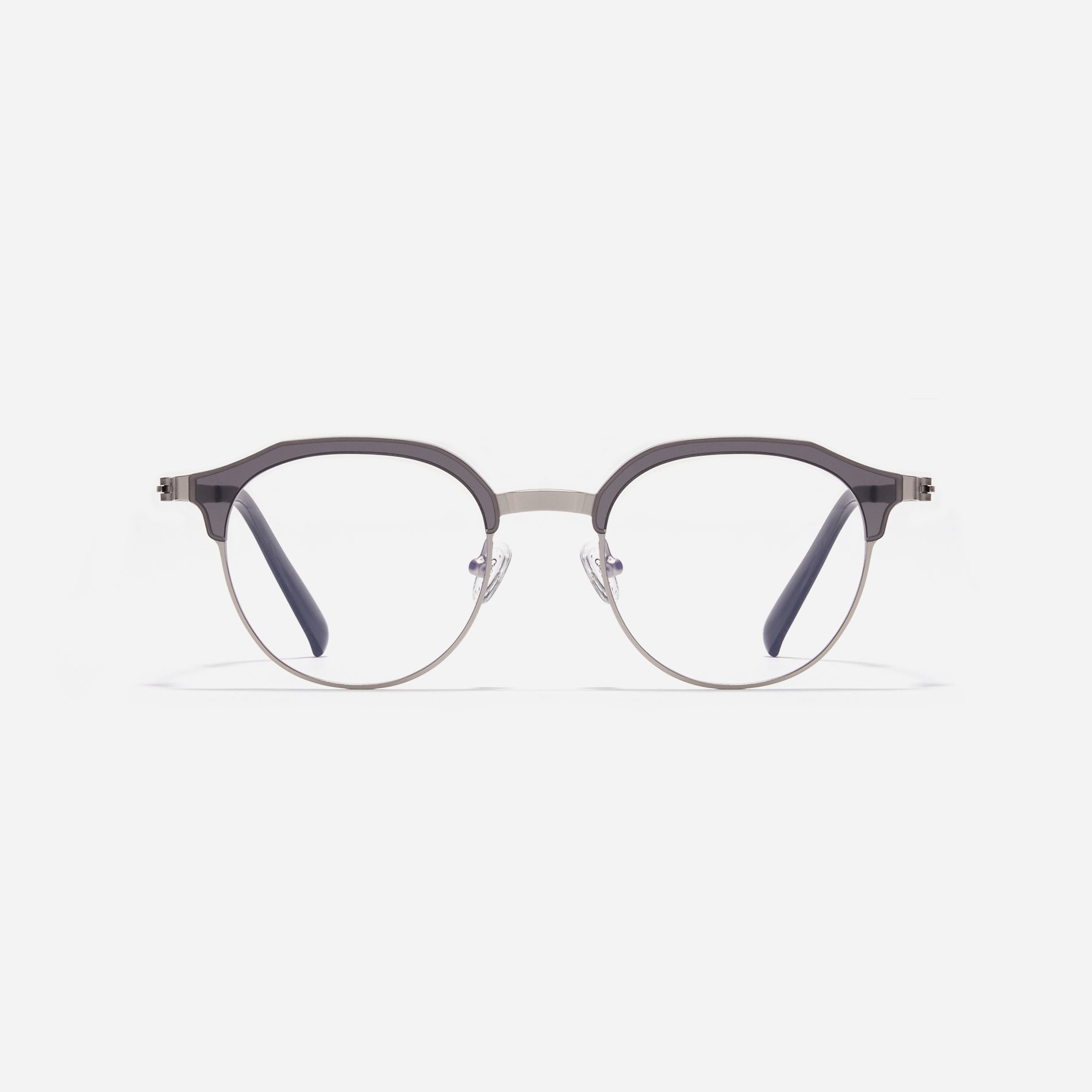 Lightweight polygon-shaped eyeglasses from CARIN's 'Feather Fit' line, offering a contemporary twist on the classic browline design. 