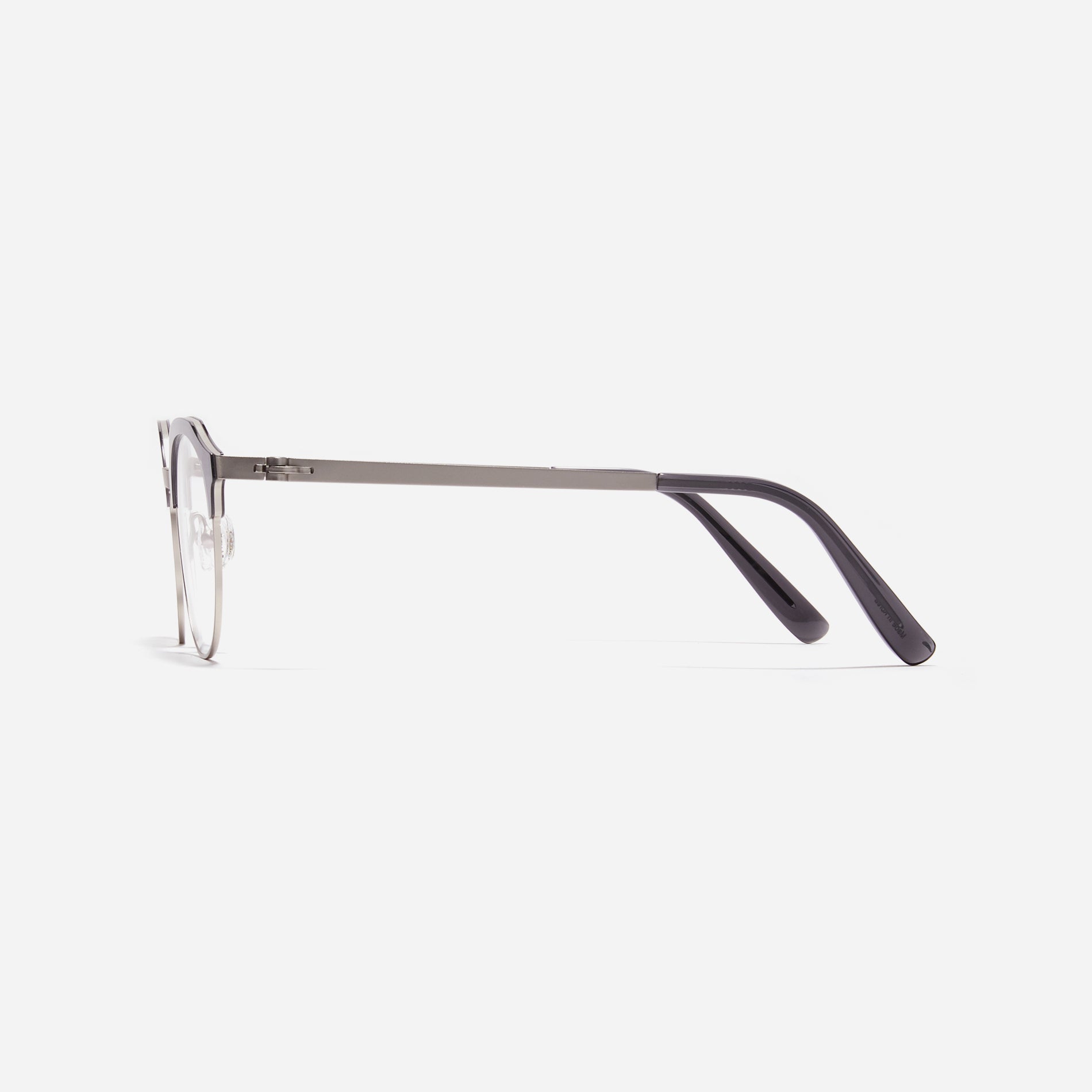 Lightweight polygon-shaped eyeglasses from CARIN's 'Feather Fit' line, offering a contemporary twist on the classic browline design. 