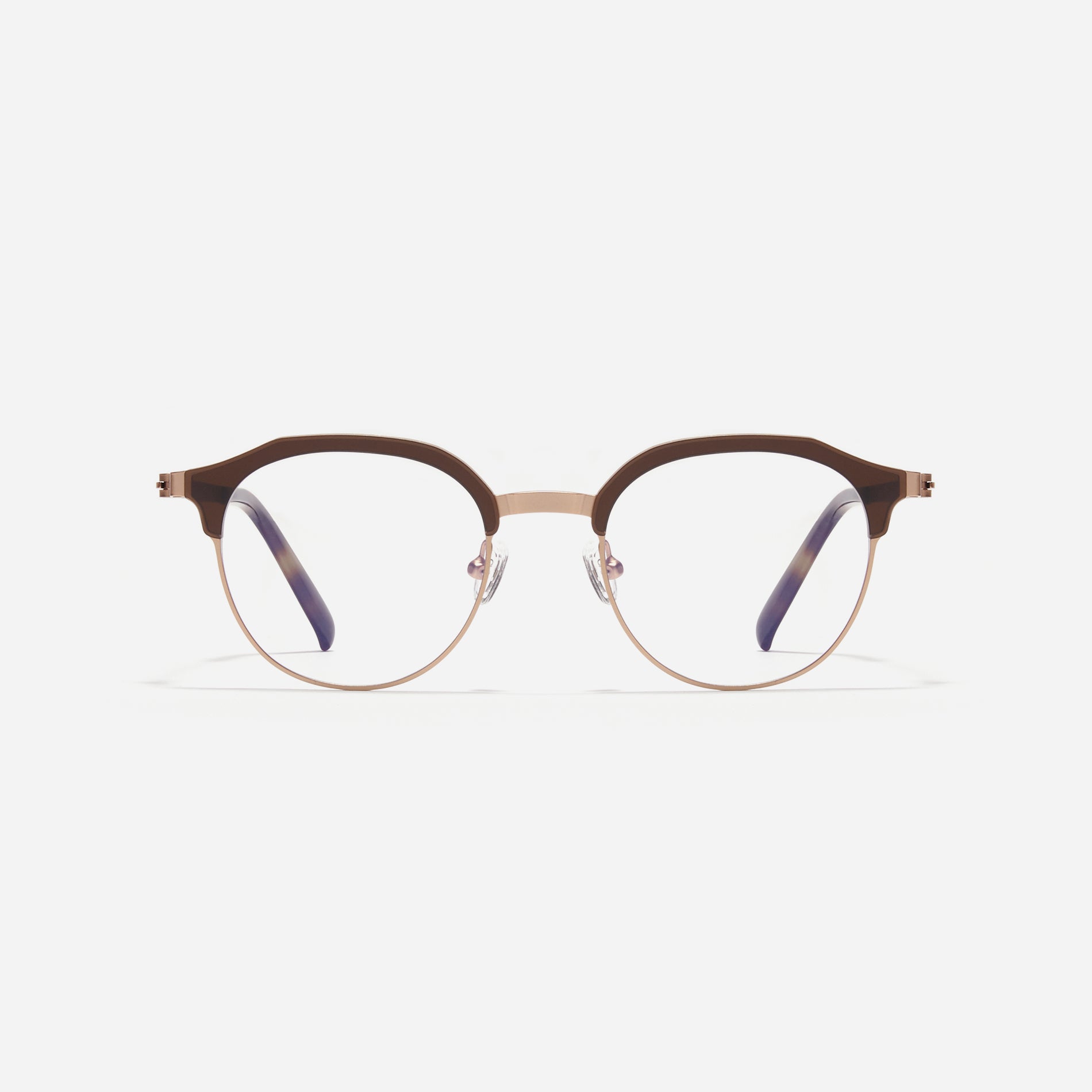 Lightweight polygon-shaped eyeglasses from CARIN's 'Feather Fit' line, offering a contemporary twist on the classic browline design. 