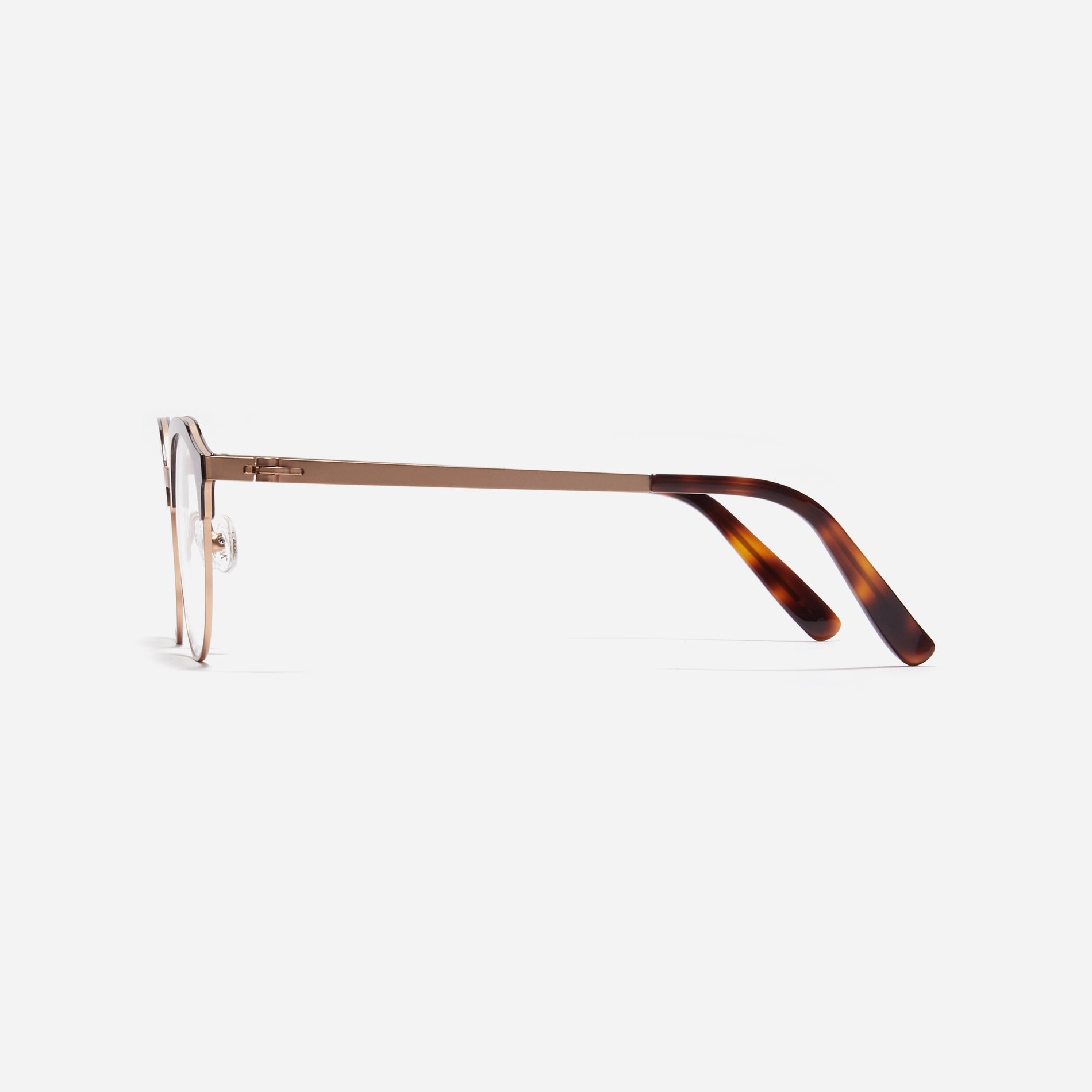 Lightweight polygon-shaped eyeglasses from CARIN's 'Feather Fit' line, offering a contemporary twist on the classic browline design. 