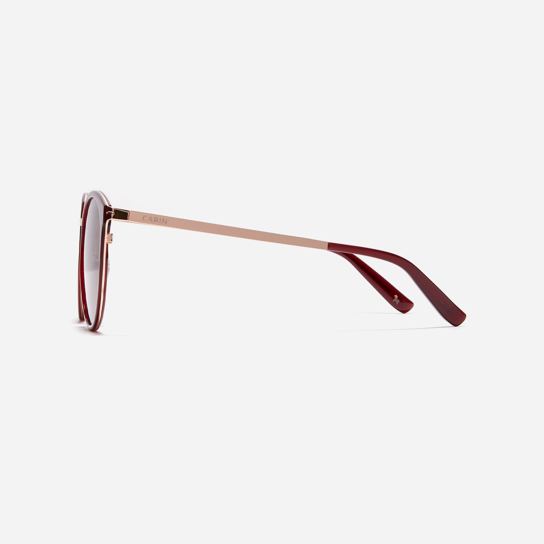 Round-shaped combination polarized sunglasses that feature delicate acetate rims and metal structural details.