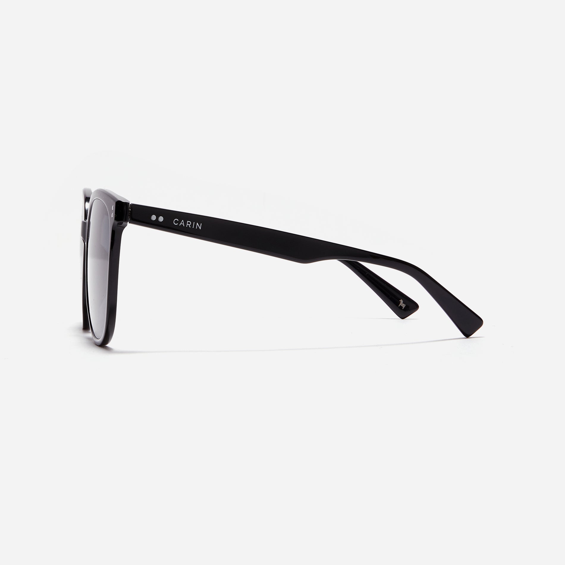 Square-shaped polarized sunglasses, crafted from compressed acetate material for enhanced lightweight properties.