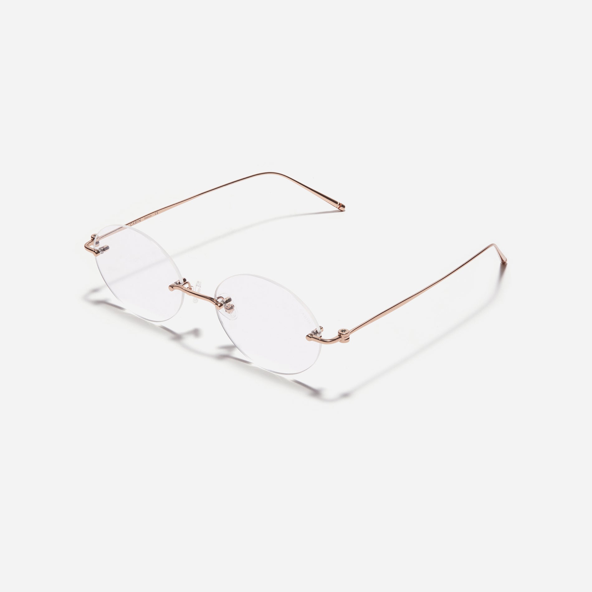  Rimless round-shaped retro eyeglasses. Featuring narrow rims and dual lining on the tips, these eyeglasses ensure a consistently comfortable fit and prevent slipping.